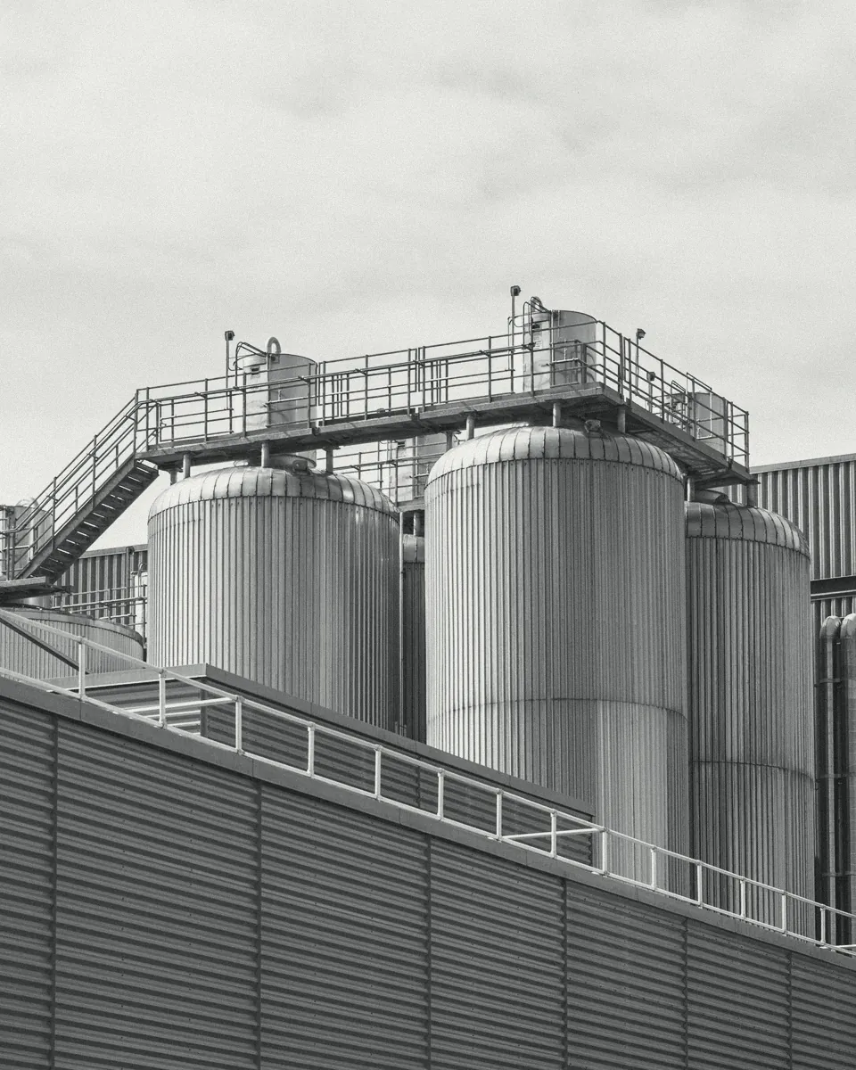 Steel silos and walkways at an industrial plant
